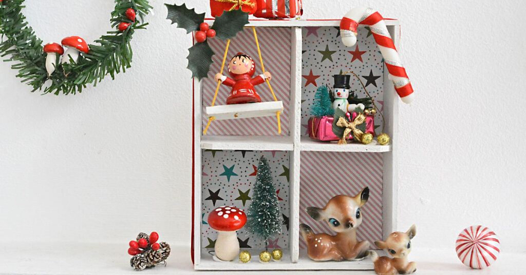 DIY Handmade Christmas diorama filled with cute vintage holiday miniatures.