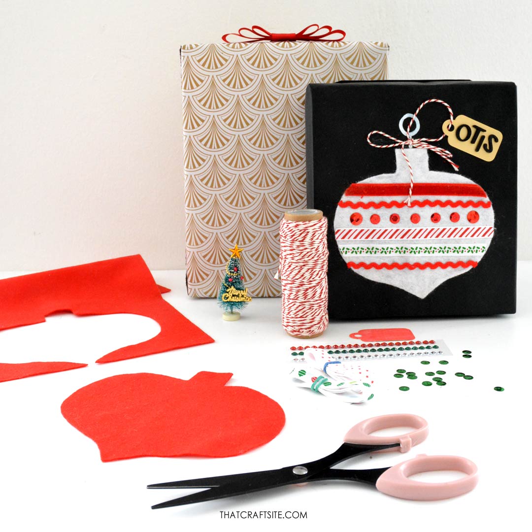 How to Decorate Christmas Gift Wrap with DIY Felt + Ribbon Ornament Step 1: Cut ornament shape from felt. thatcraftsite.com.