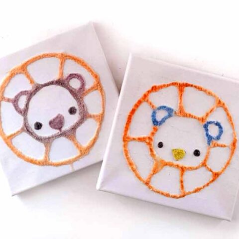 Two cute lion watercolor salt art paintings.