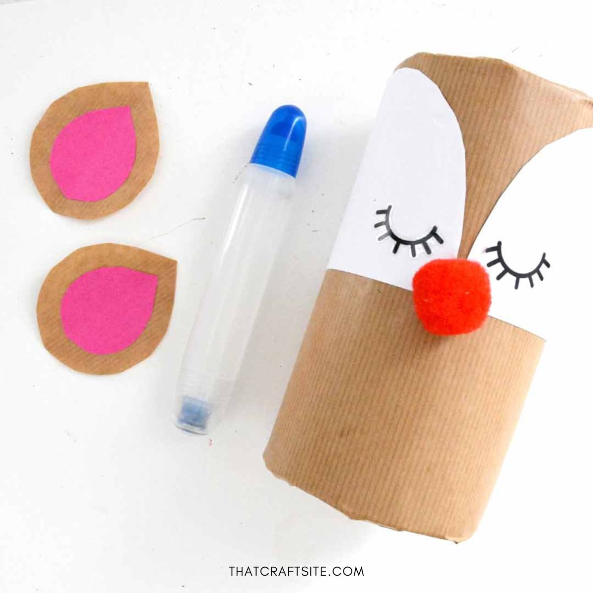 DIY Cylinder Christmas Reindeer Gift Wrap. Step 6: Glue pink ear shapes on top of larger brown ear shapes.